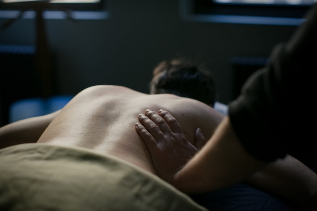 deep tissue massage low back medium close up when safe after injury nyc