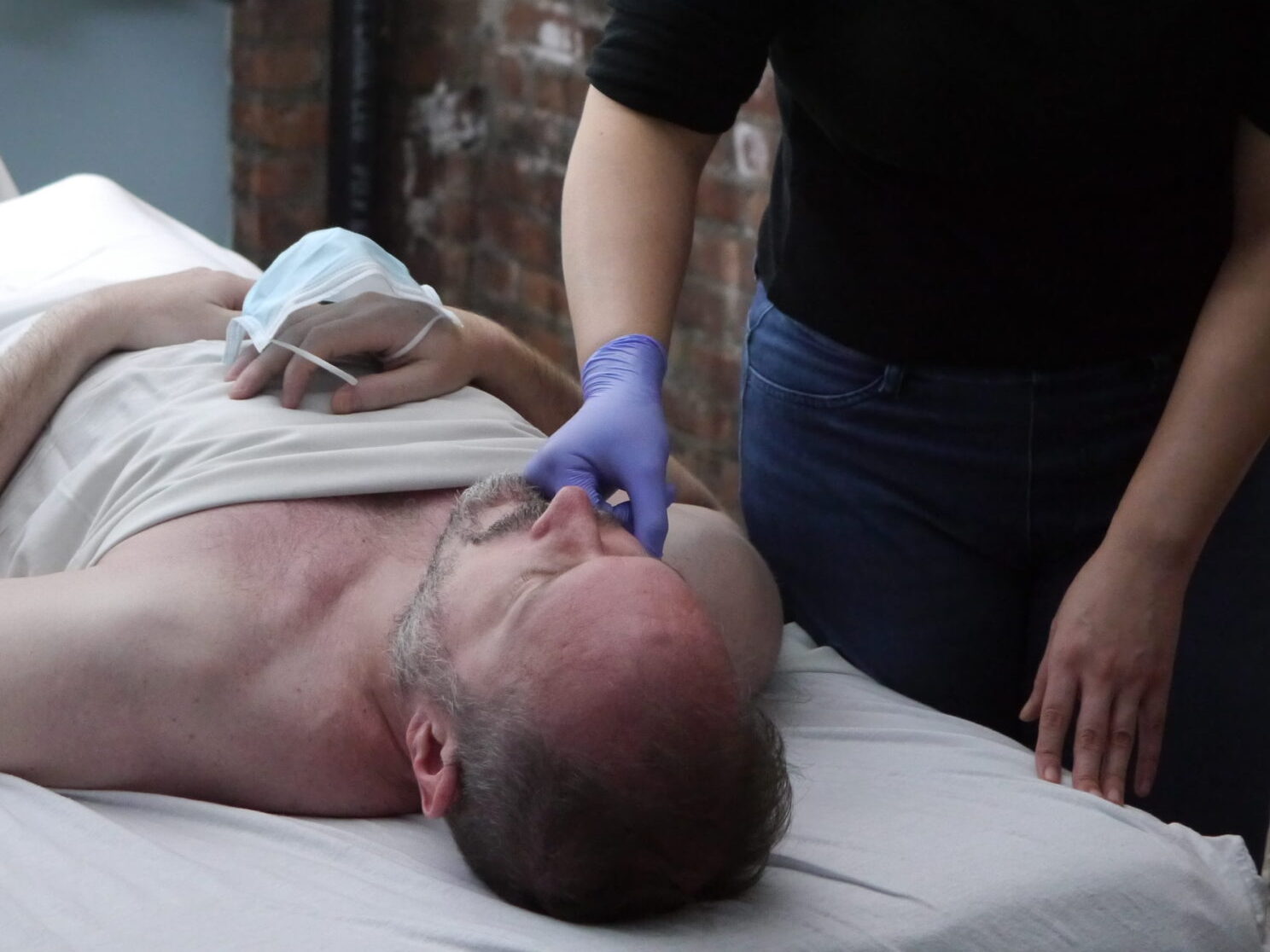 David Weintraub teaching TMJ massage intraoral pterygoid release training with therapist Ann Perez NYC