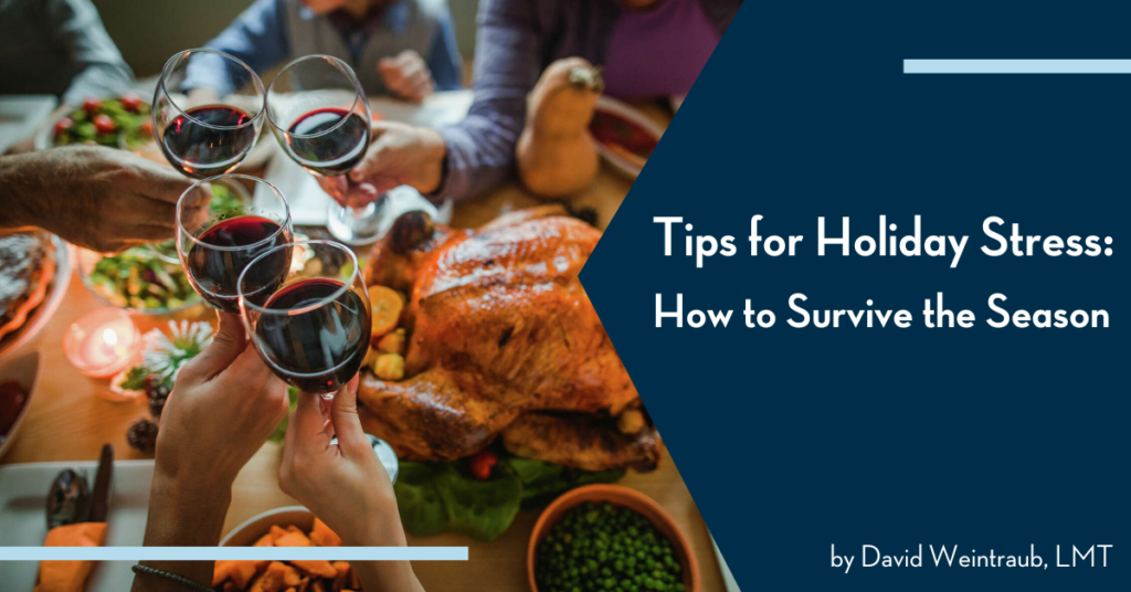 holiday dinner with family toasting on a glass of wine