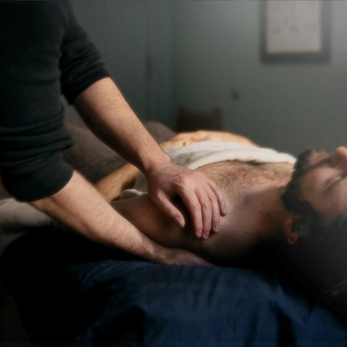 man having a shoulder pain, shoulder replacement recovery massage